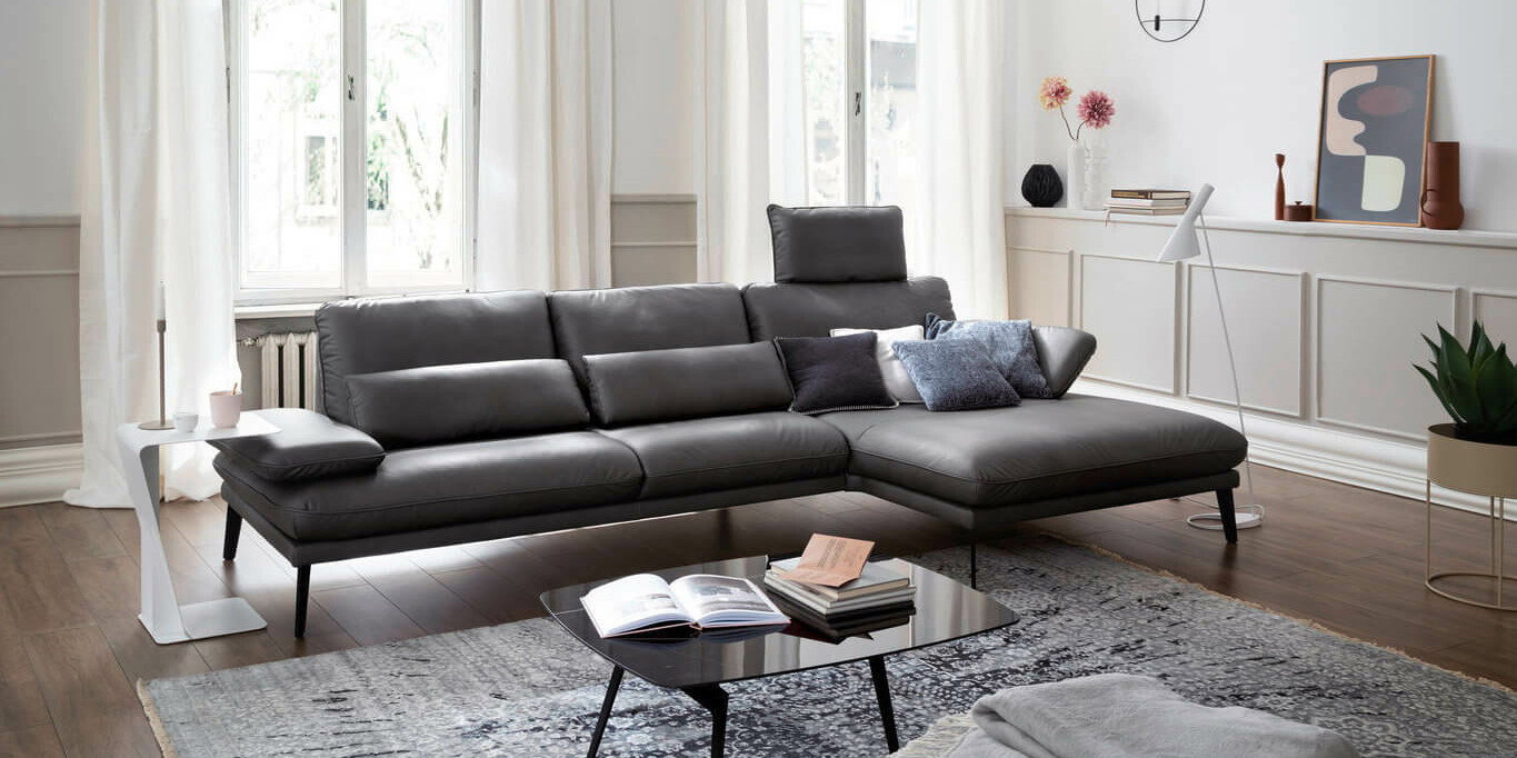 Welcher Teppich passt am besten zu einem grauen Sofa?