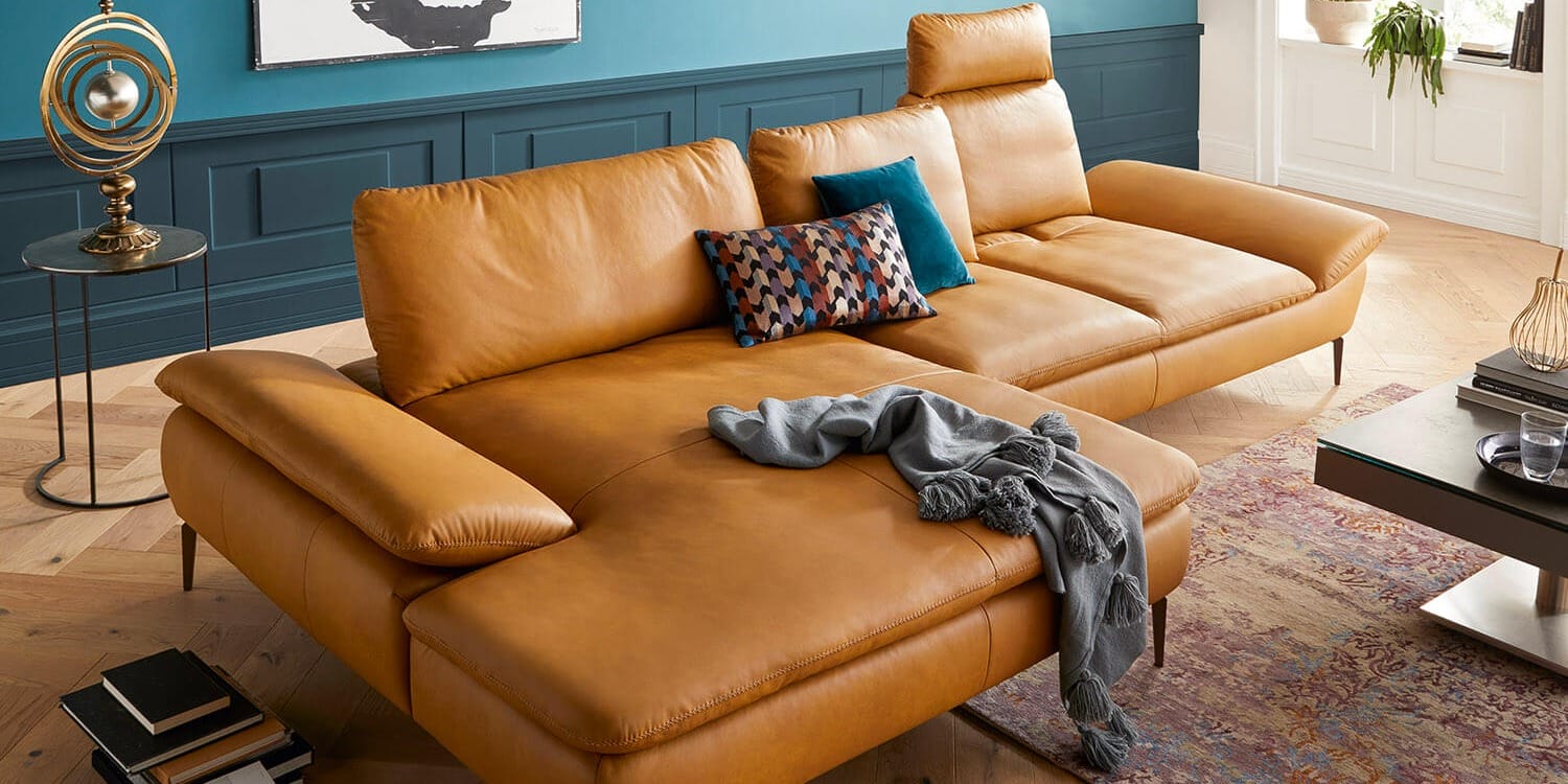Contur Sofa Leder Vintage Leder mit Petrol Kontrast an den Wänden