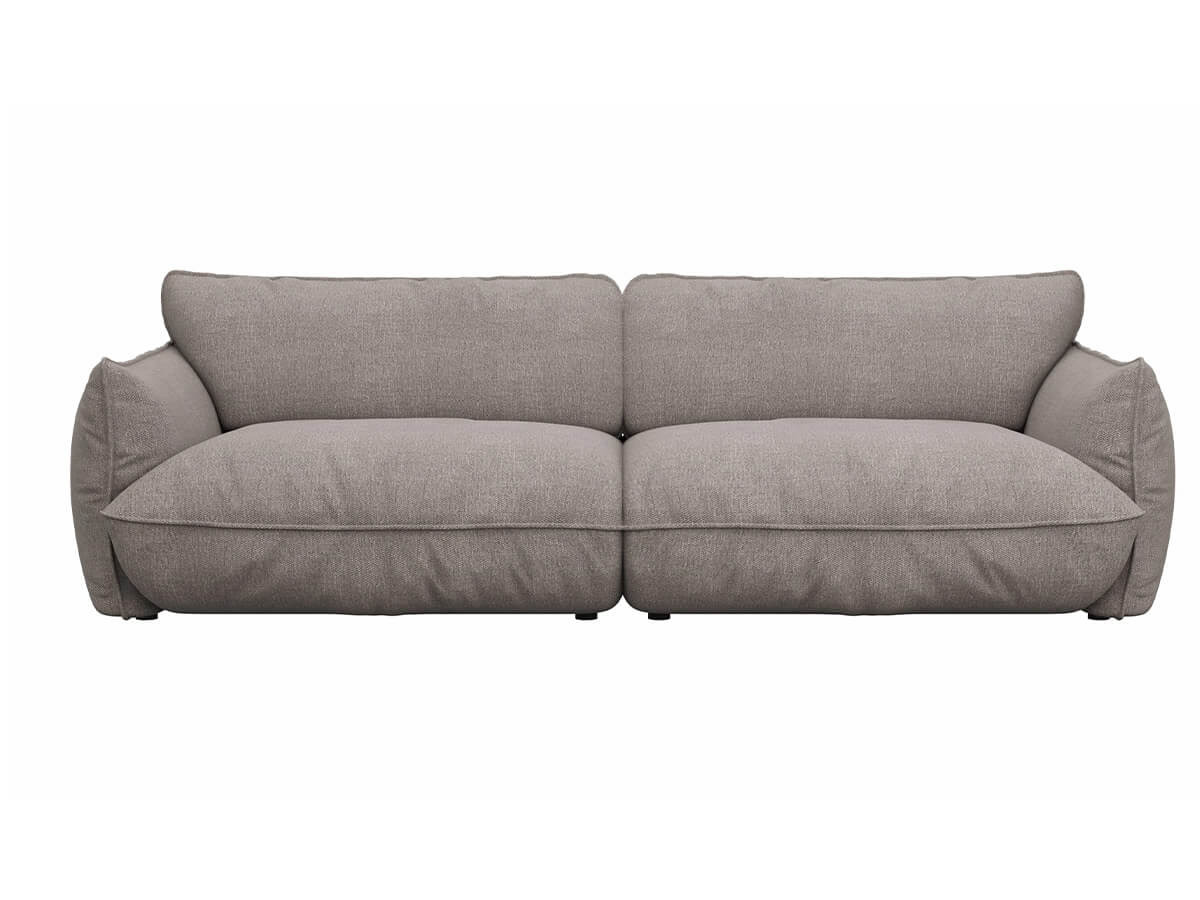 Modernes Ecksofa in Taupe mit verstellbarer Sitztiefe und hochwertiger Polsterung in einer hellen Wohnzimmer-Umgebung